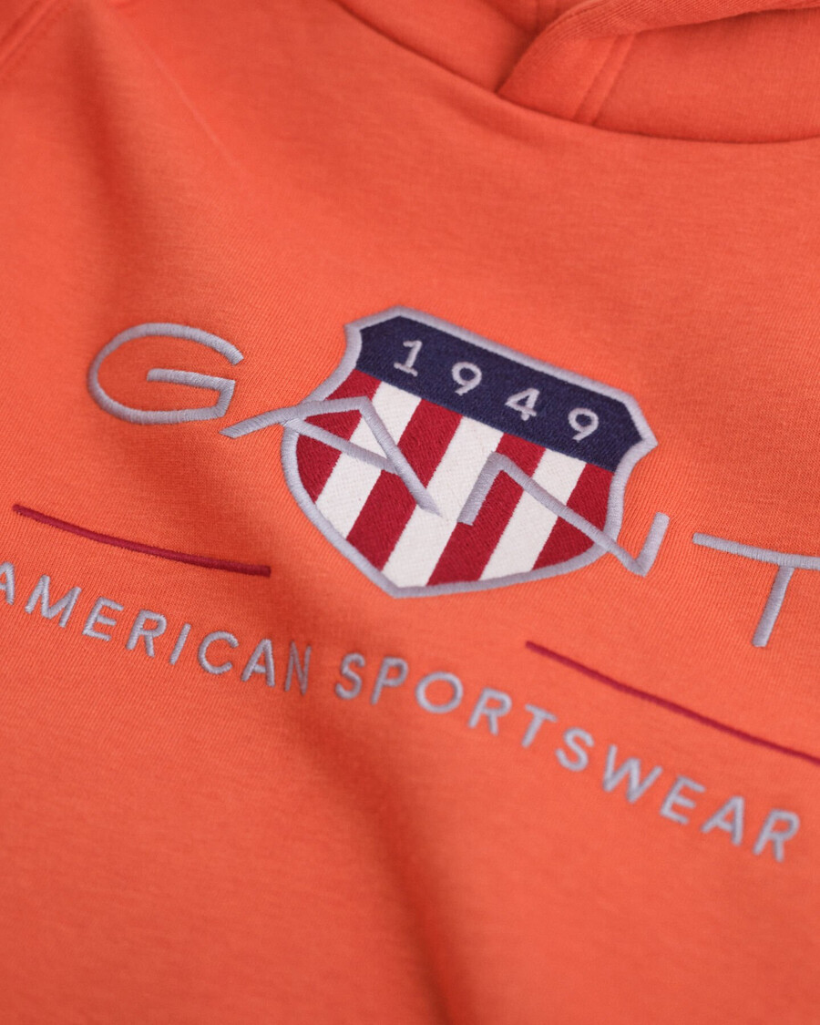 bluza z kapturem teens archive shield – głęboka pomarańcza