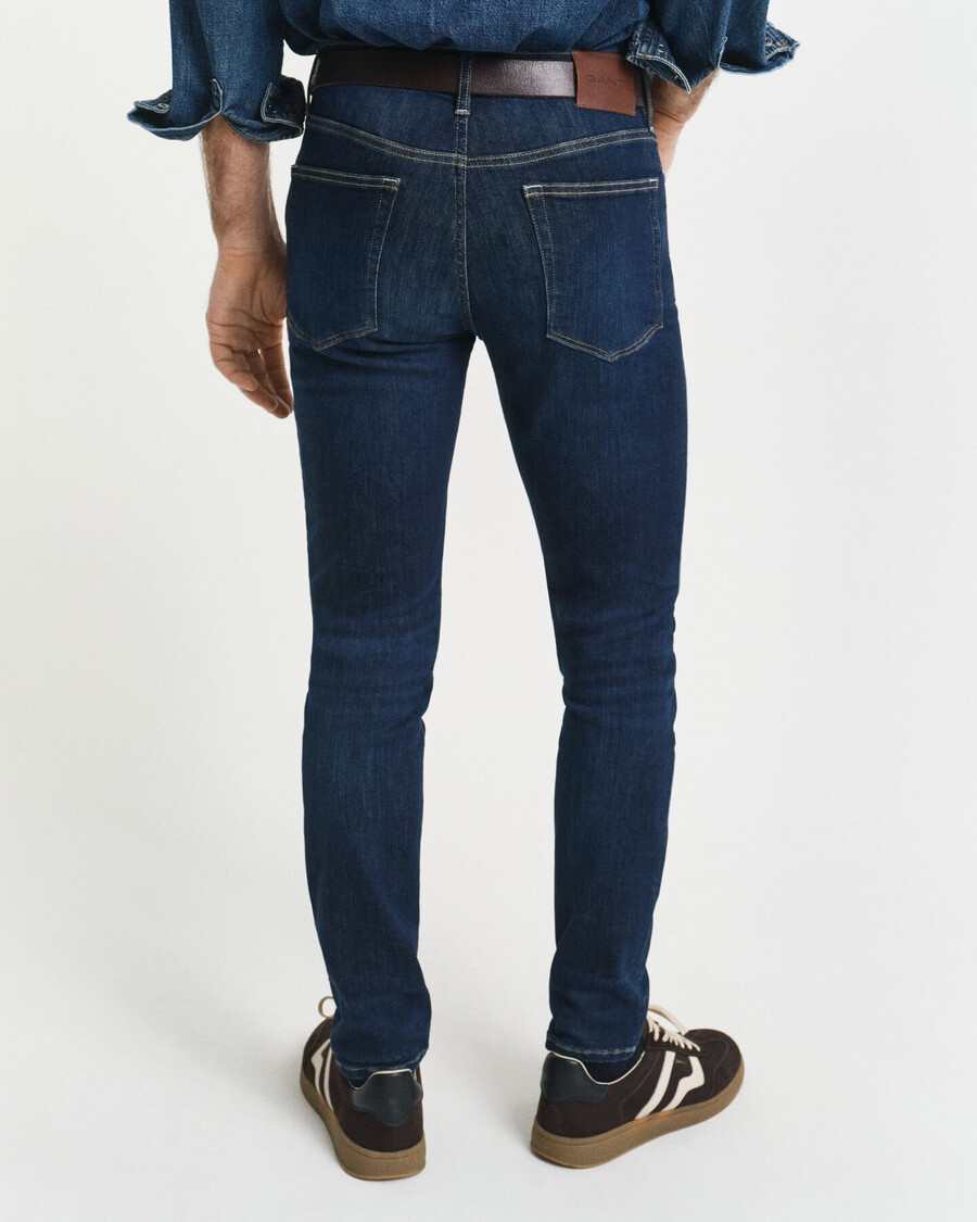 jeansy active recover extra slim fit – ciemnoniebieskie znoszone