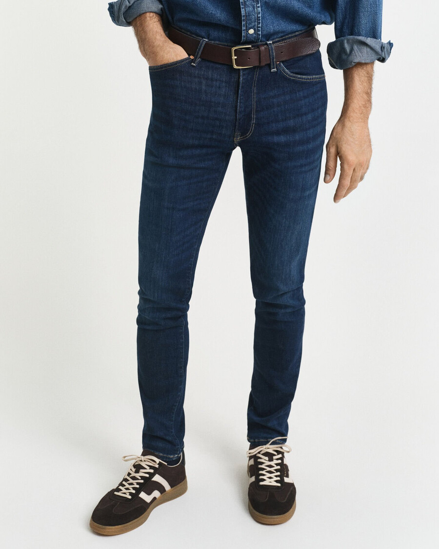 jeansy active recover extra slim fit – ciemnoniebieskie znoszone