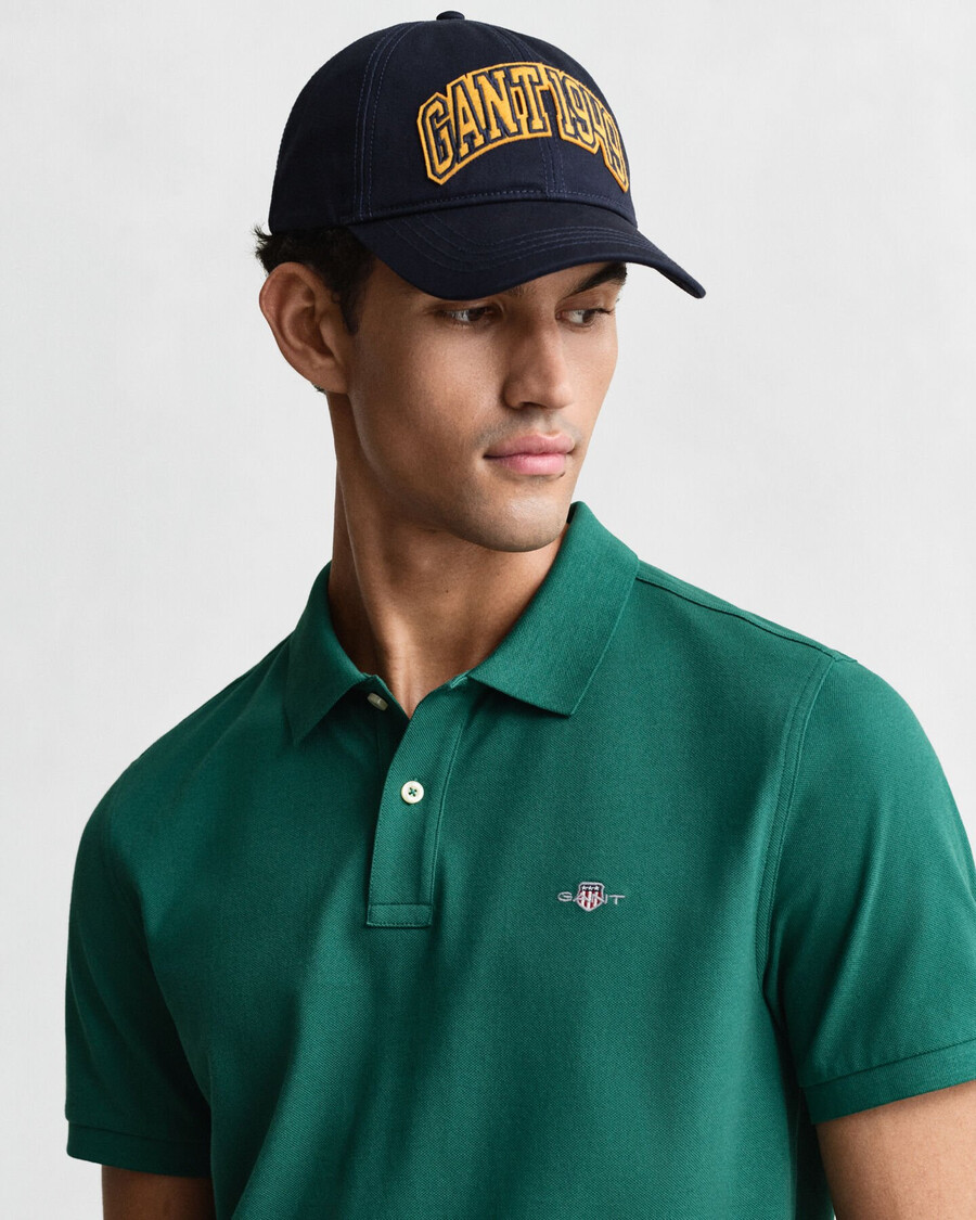 koszulka polo z piki shield regular fit w kolorze głębokiej zieleni leśnej